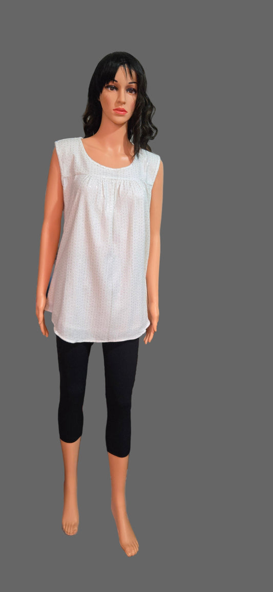 white long sleeveless top